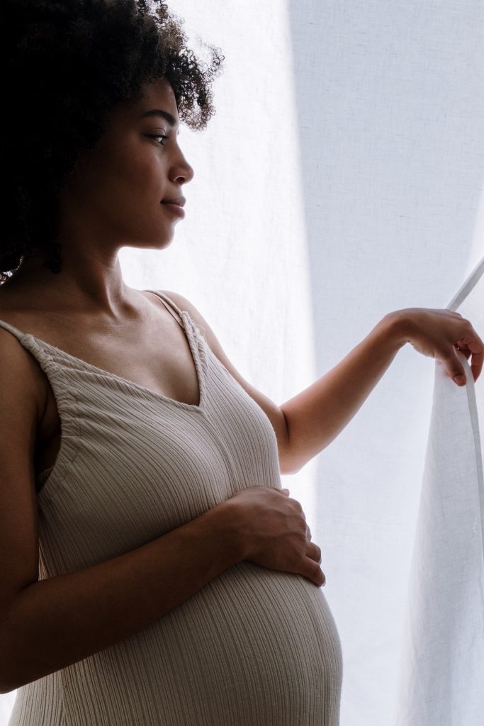 Pregnant woman standing
